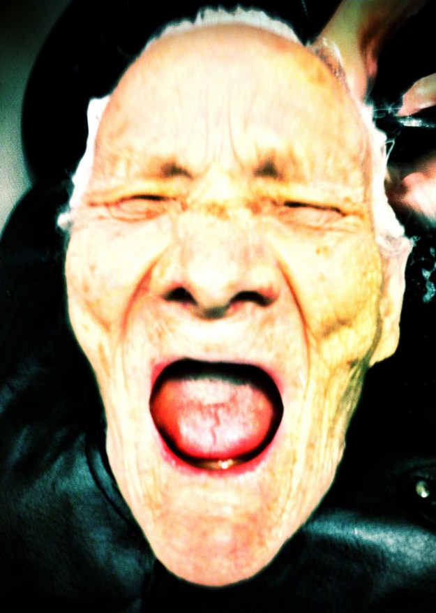 This is actually Grandma goofing while getting her hair washed at the salon, But it sums up how she feels about being asked to take a bath.