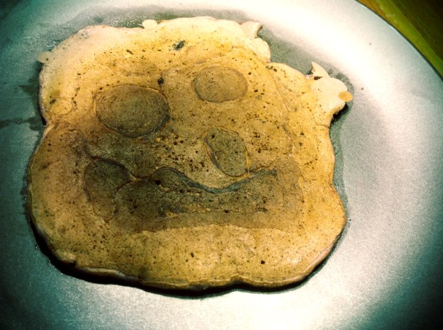 My own pancake was not quite as amused as Grandma's.