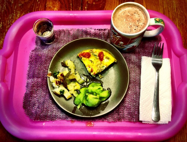 Asparagus, Goat Cheese, bacon and garlic frittata, kiwi fruit and twice-baked potato with cheese, hot cocoa and meds.